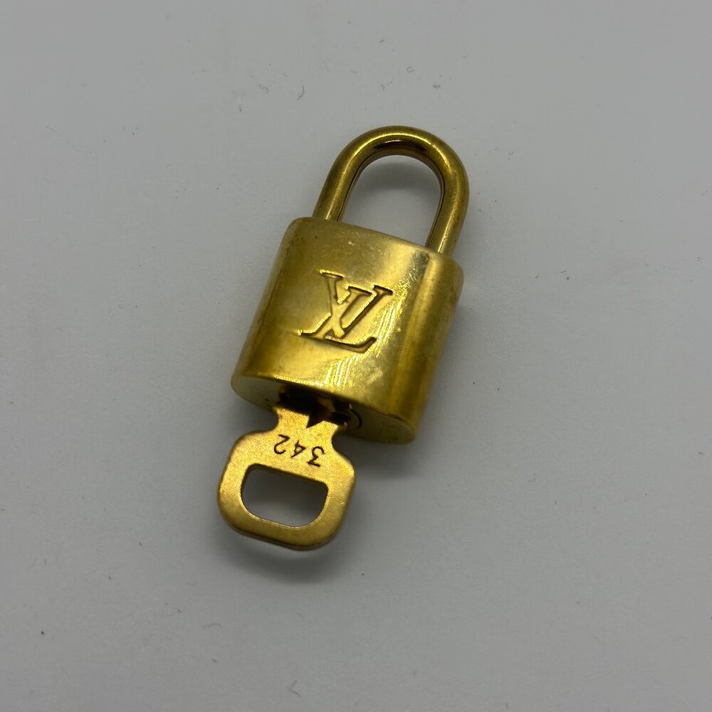 LOUIS VUITTON Lock and Key Gold Brass Padlock Set (Preowned)